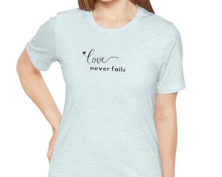 Women's Love Never Fails Short Sleeve Tee
