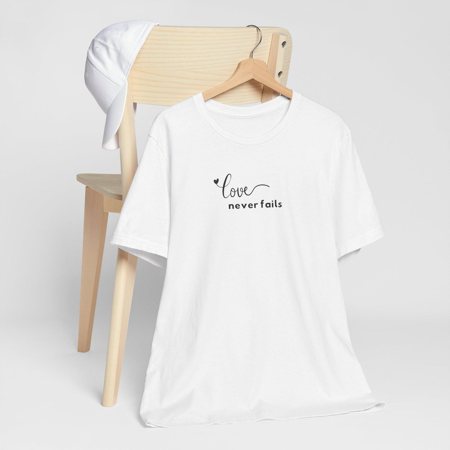 Women's Love Never Fails Short Sleeve Tee